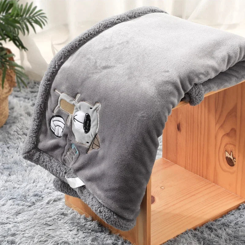 Couvertures brodées